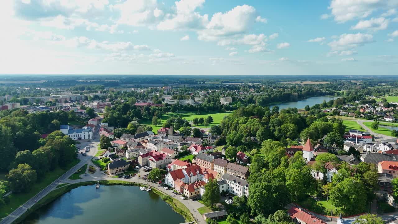 Talsi, Latvia, aerial view of the city center with its lake and surrounding nature on a beautiful summer day, showing the colorful houses and lush greenery