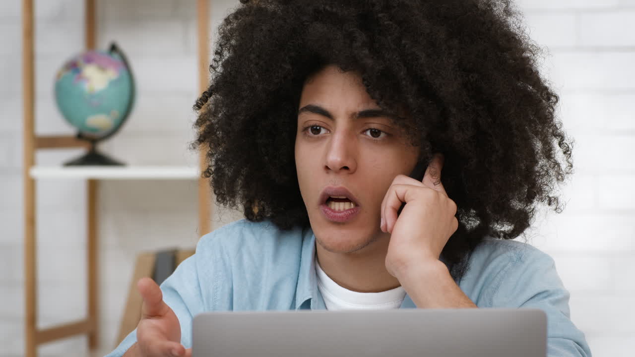 Man Arguing on Phone