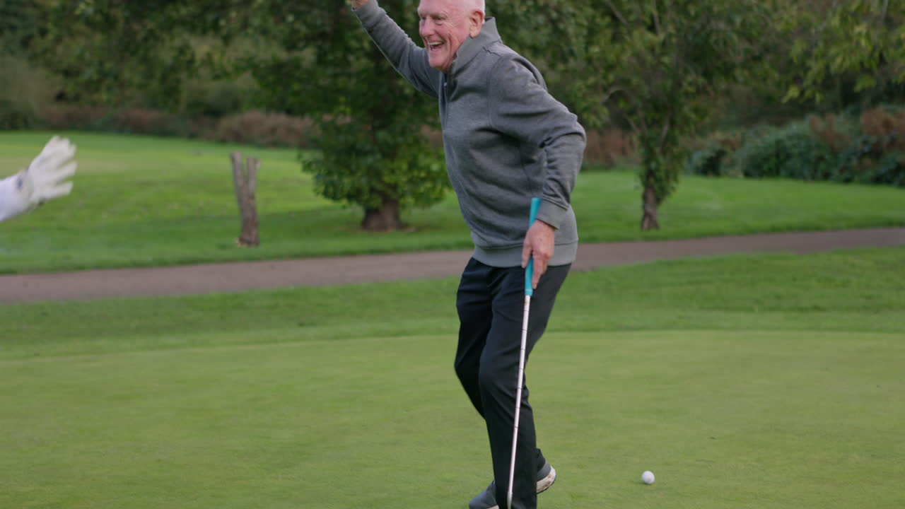 People golfing and celebrating on a golf course