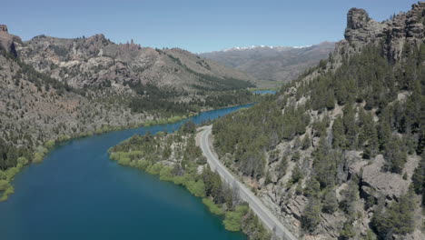 aerial - limay river and highway in valle encantado, patagonia, neuquen, argentina, forward