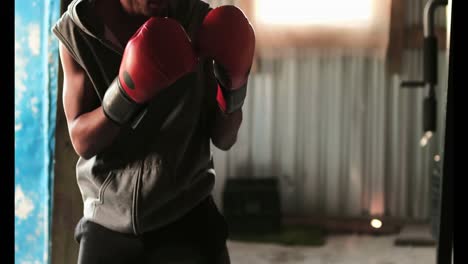 african american male boxer practicing boxing with trainer in fitness studio 4k