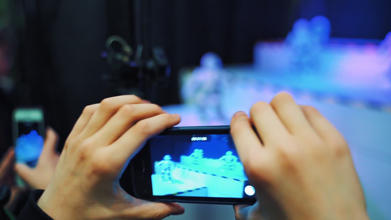 Science Festival. Humanoid futuristic robot dancing at technology exhibition. Future, entertainment and robotic concept