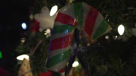 candy cane hanging on a christmas tree