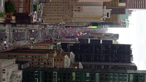 crowded times square, overcast in new york, usa - vertical, aerial, overlook