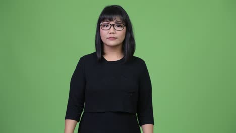 beautiful asian businesswoman with arms crossed