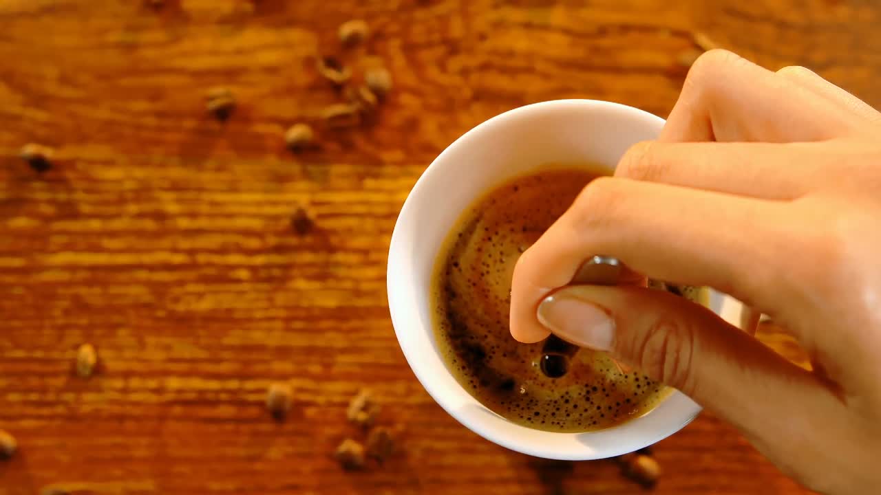 Stirring coffee with spoon 4k
