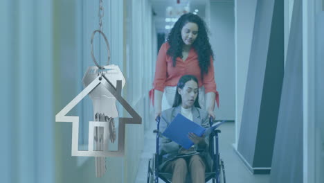 animation of house and key over biracial businesswoman in wheelchair with colleague in office