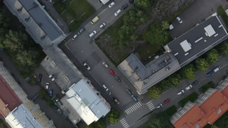 flying above buildings roofs. drone top down view