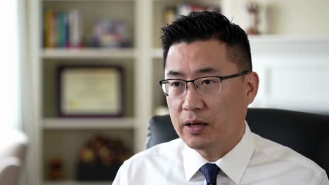 professional asian businessman on video conference call