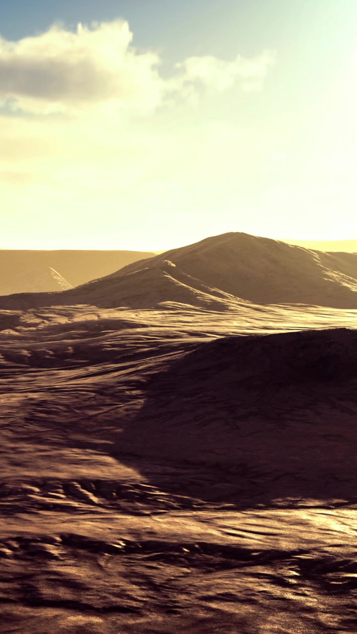 Paesaggio desertico che risplende alla luce dorata del sole nel tardo pomeriggio