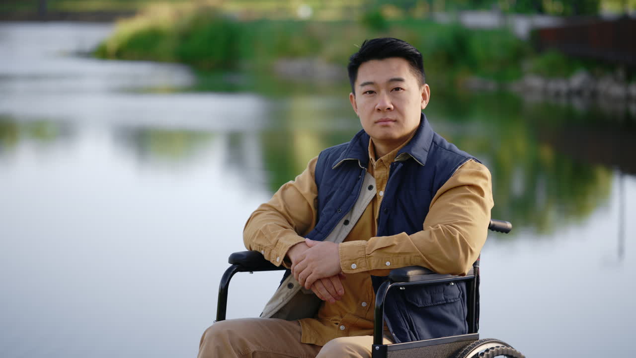 Man in Wheelchair by a River