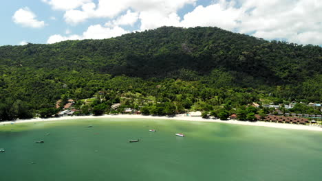 Drone-flight-approaching-a-beautifull-beach-in-Thailand