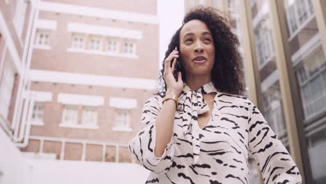 an attractive young businesswoman feeling cheerful
