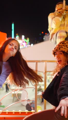 mannequin display at a nighttime carnival