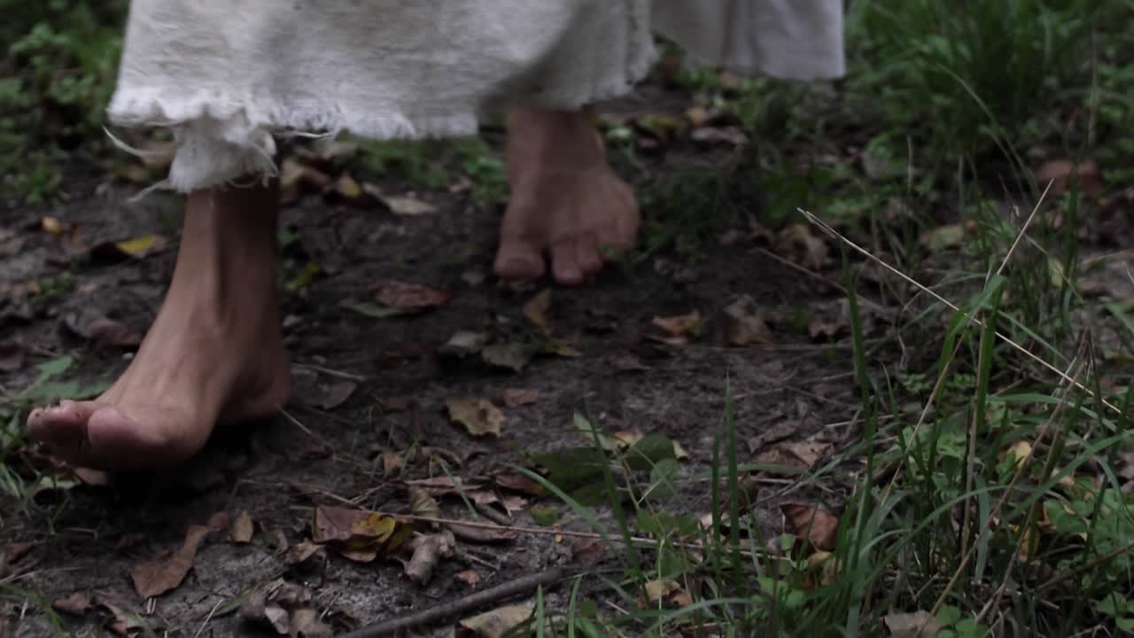 Barefoot Woman Walking on a Path