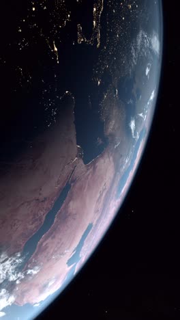vertical establishing shot of egypt and the nile at night as dawn breaks