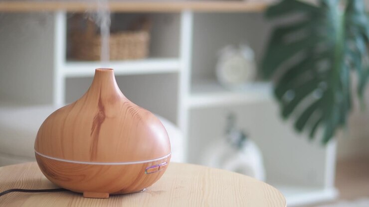 Æterisk olie diffuser på et bord