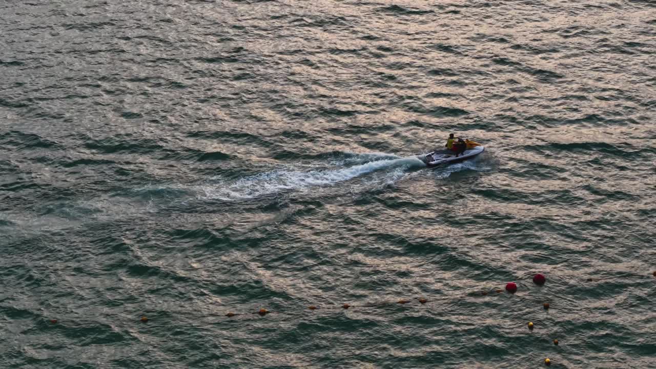 Drone footage of a jet ski in Acapulco Bay, Mexico