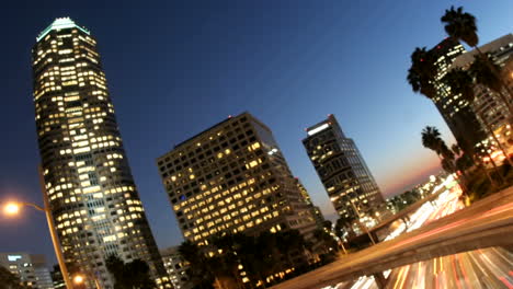 Timelapse-of-traffic-moving-fast-on-a-highway-near-downtown-Los-Angeles