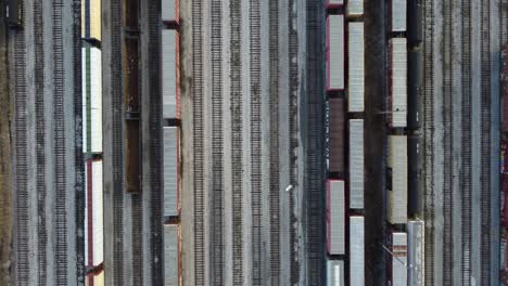 Magnificent top view capture of a train station with many accesses
