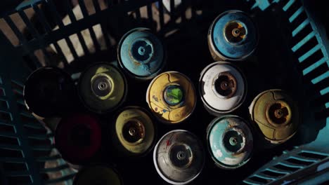 Aerosol-cans-arranged-in-the-basket-4k