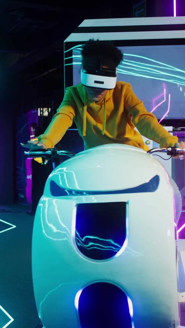 A person experiencing virtual reality on a VR motorcycle arcade machine