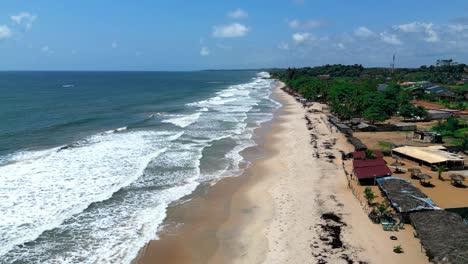 ariel view of waves on the beach in san pedro, côte d'ivoire, west africa