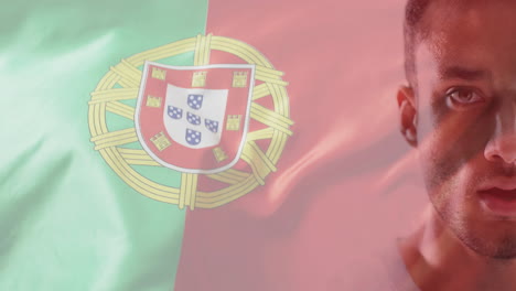 animation of flag of portugal over biracial male athlete