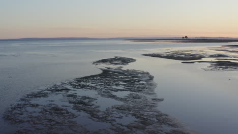 wetland and river drain in the ocean, carretera austral in north patagonia of chile