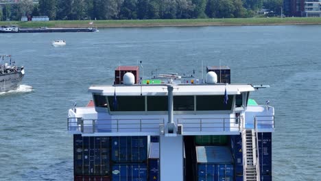 the bridge and navigation system of a large container ship sailing to destination