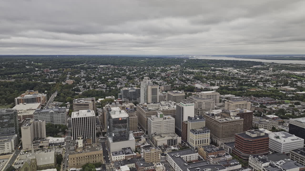 Wilmington Delaware Aerial v14 flyover downtown capturing Midtown cityscape, surroundings residential houses and river along the skyline on overcast sky - Shot with Mavic 3 Pro Cine - Sept 28th 2023