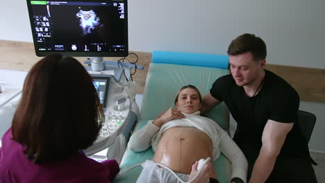 ultrasound appointment with pregnant couple