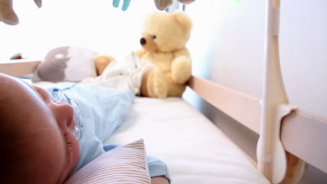 baby boy sleeping in crib