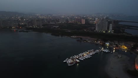 Late-afternoon-aerial-view-shots-of-the-coastal-areas-of-Porlamar-located-in-Margarita-Island-in-the-country-of-Venezuela