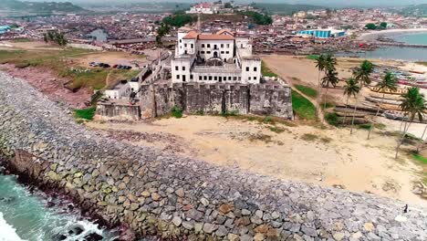 two big ancient building located at elmina, ghana, west africa