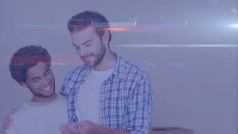 animación de senderos de luz sobre una feliz pareja gay masculina diversa