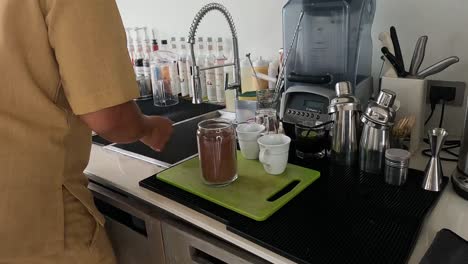 sequence of pouring and stirring coffee in a kitchen.