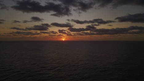 static sunrise shot looking out to the horizon from tofo beach, mozambique