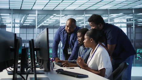 diverse team working together in data center