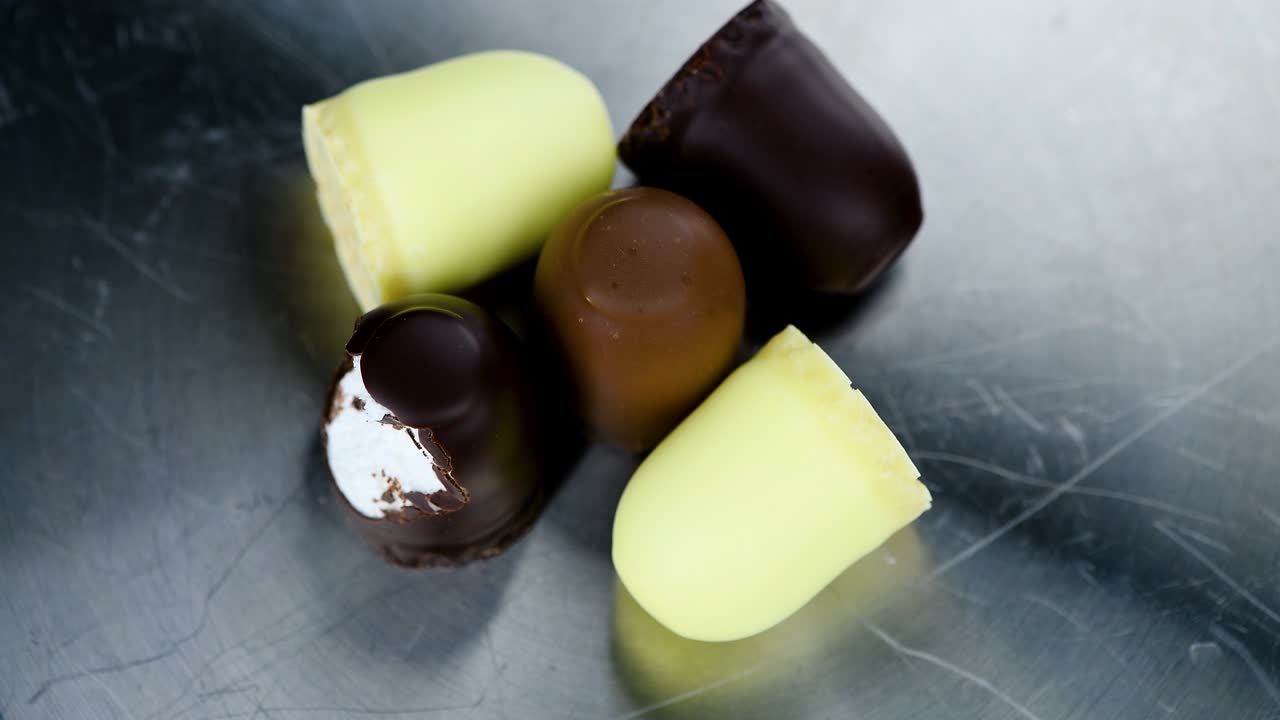 marshmallows de chocolate como imágenes de bucle sin costuras