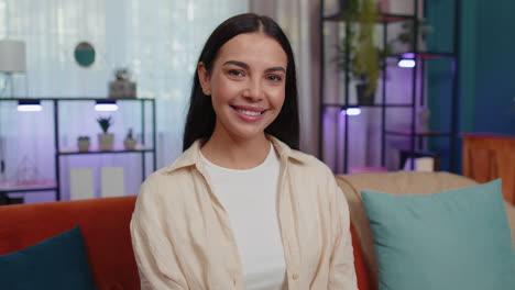 Close-up-portrait-of-happy-smiling-caucasian-woman-in-shirt,-looking-at-camera,-celebrate-good-news