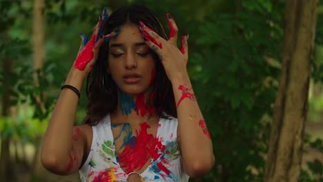 a young girl in a tropical park setting exhibited creativity through body painting close up