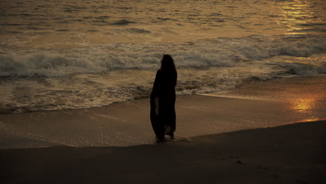 lady walking in a beach