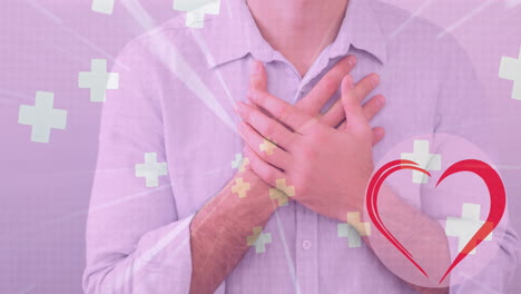 animación de corazón y cruces iconos sobre el hombre caucásico sosteniendo su pecho