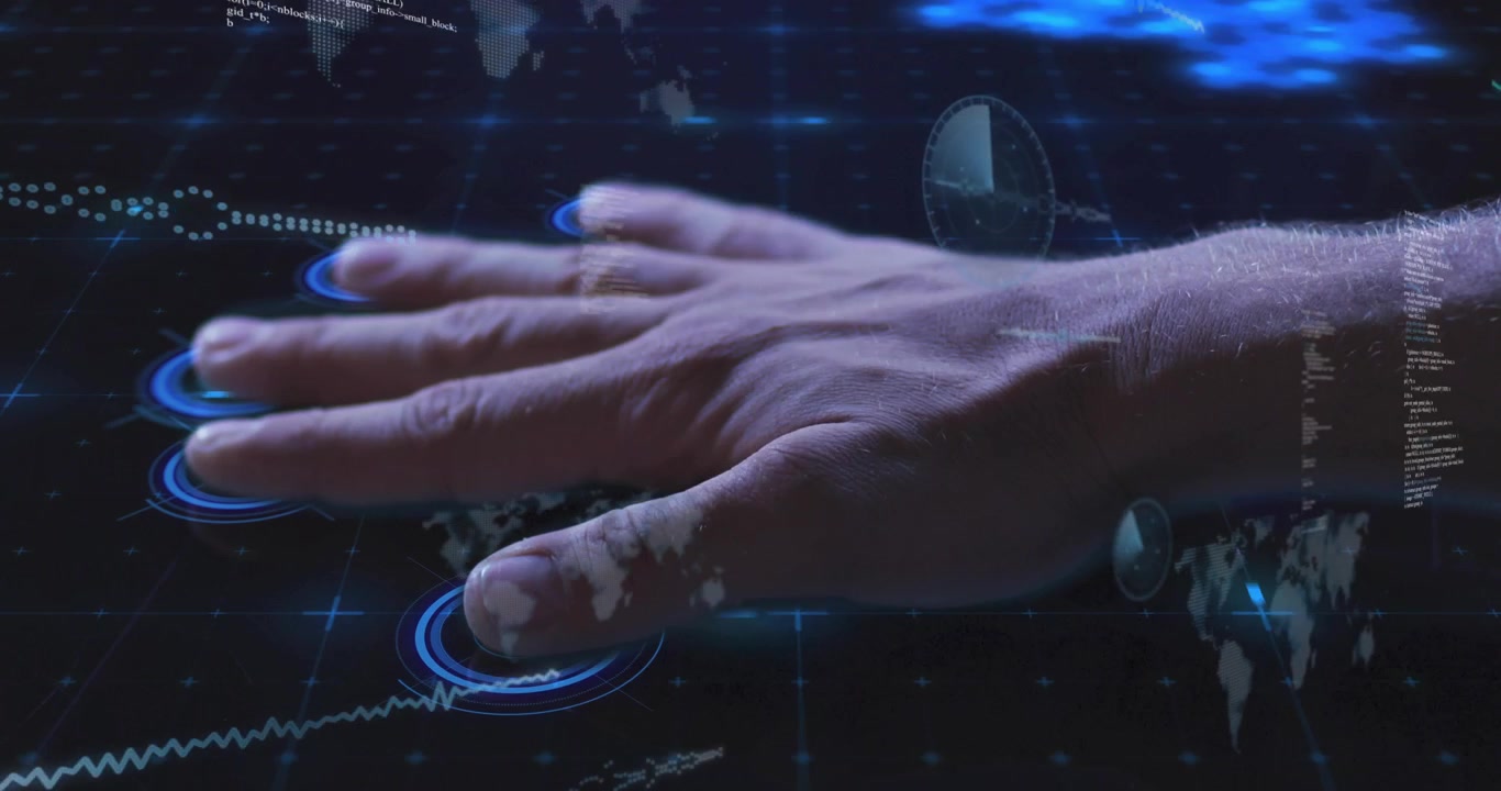 Man's right hand sliding activating hologram map with reticles and scrolling code for data analysis