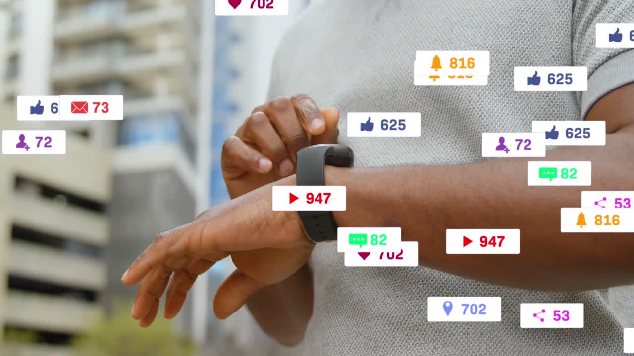 Animation of social media icons floating over mid section of a man using smartwatch outdoors
