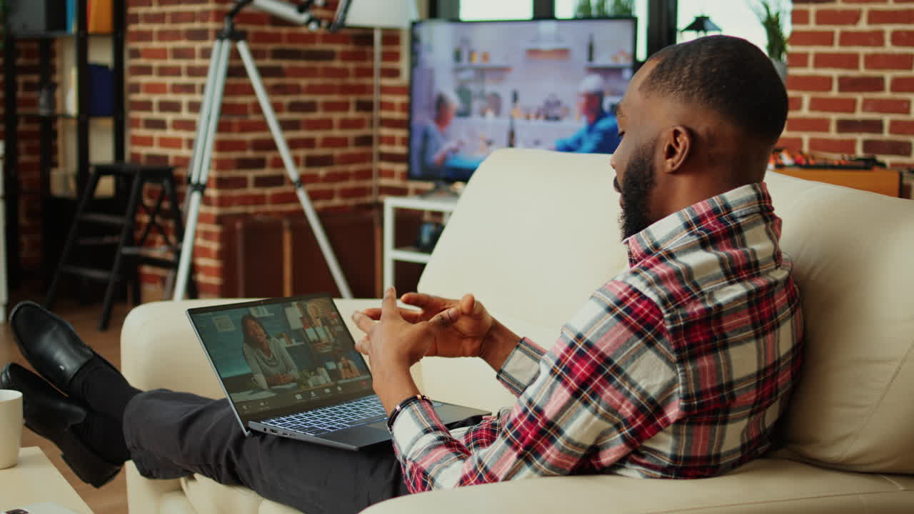 Man on video call at home