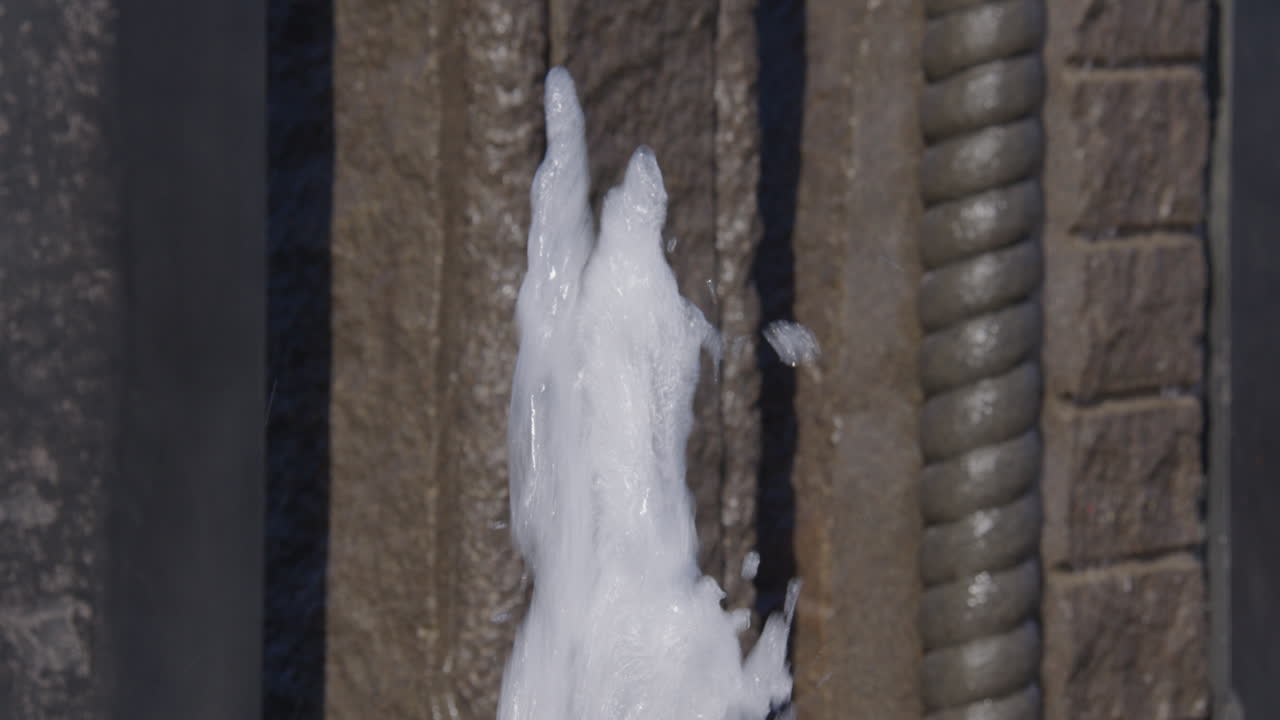 Close shop shot of a bubble water fountain feature at Nupen fontenen at Nupen parken, Kristiansand