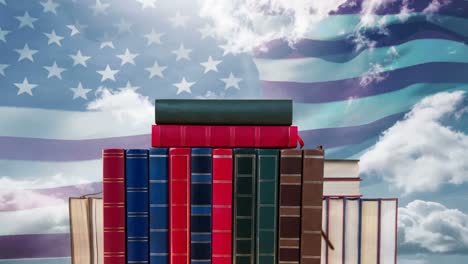 american flag and school book