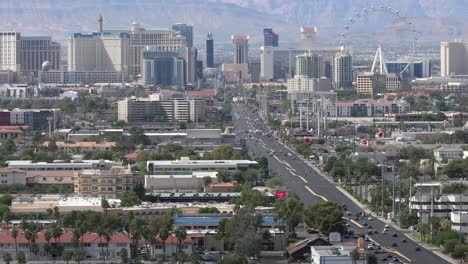 las vegas strip, nevada tilt up zoomed in aerial reveal in daytime